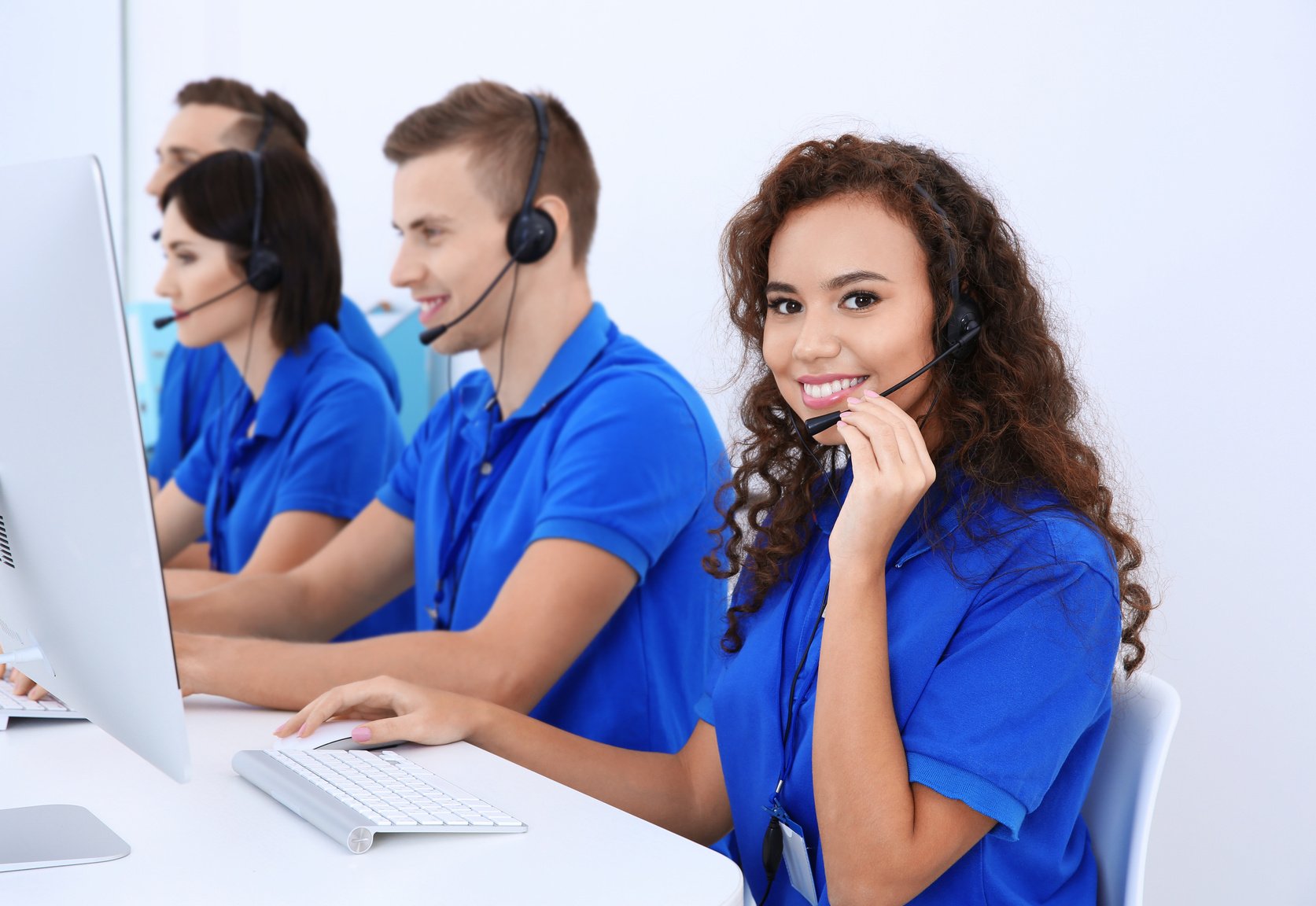 Team of Technical Support Dispatchers Working in Office